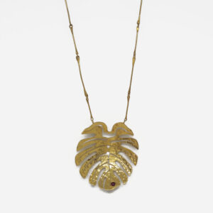 Unique necklece with ruby colour stone