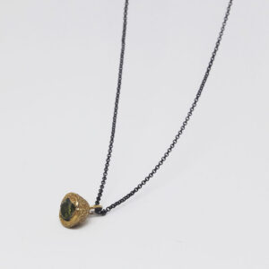 Eucalyptus seed pendant with peridot stone